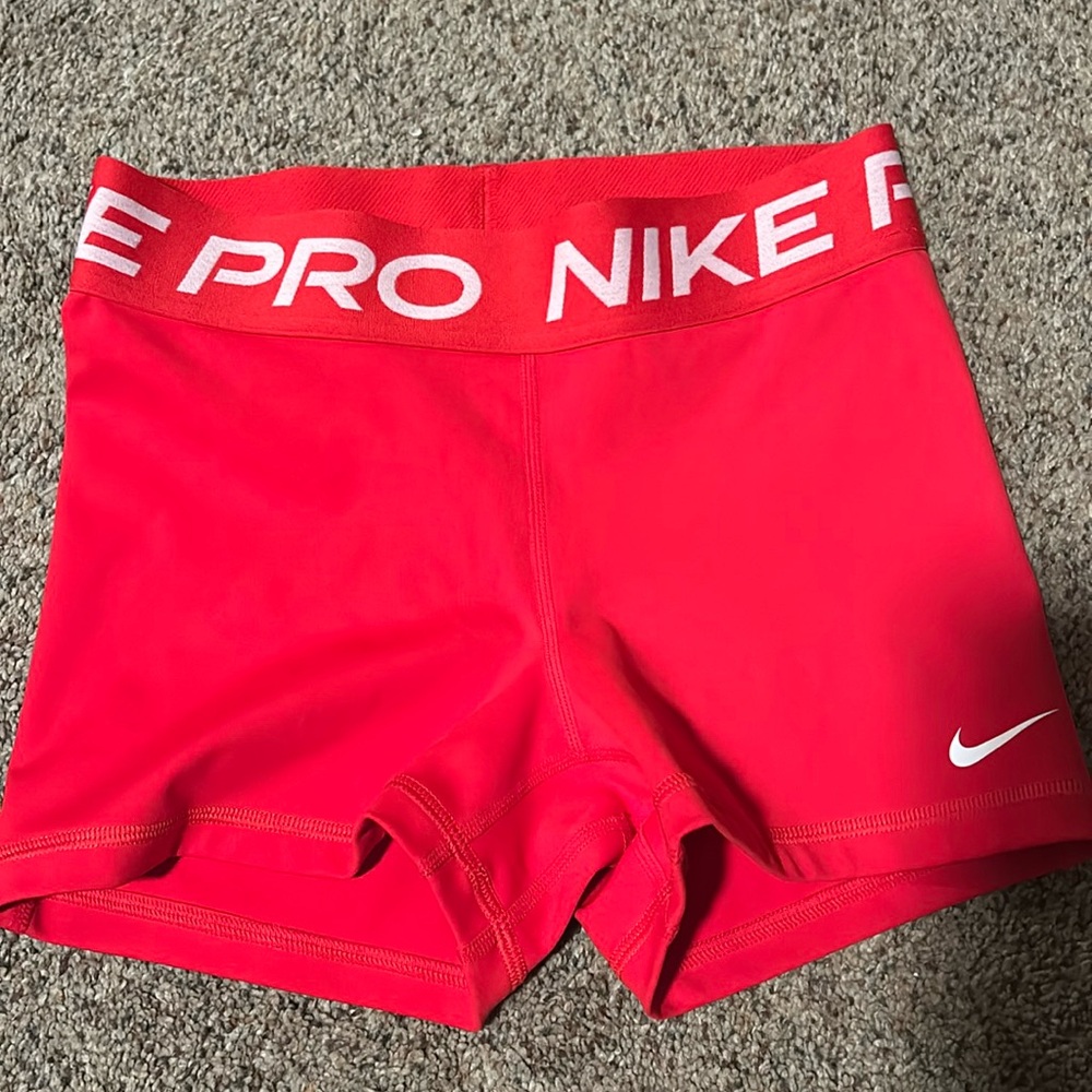 Women's red Nike Pro size small